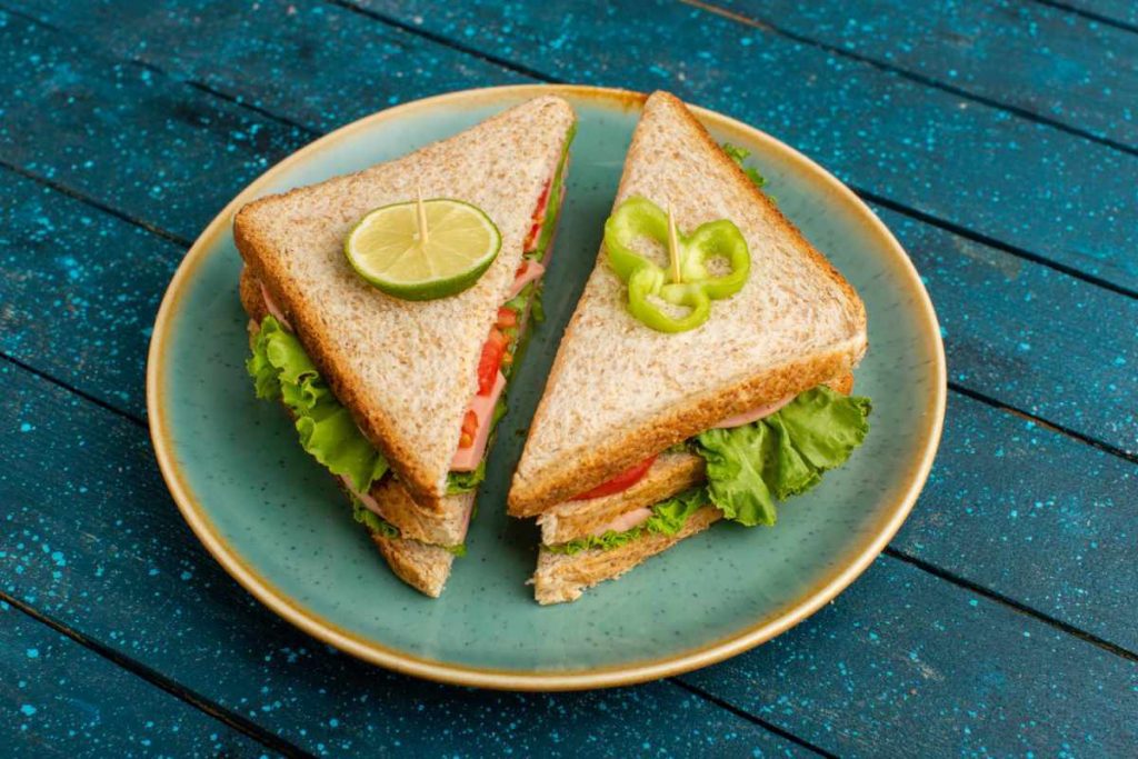 Delicious Sandwich inside a blue plate