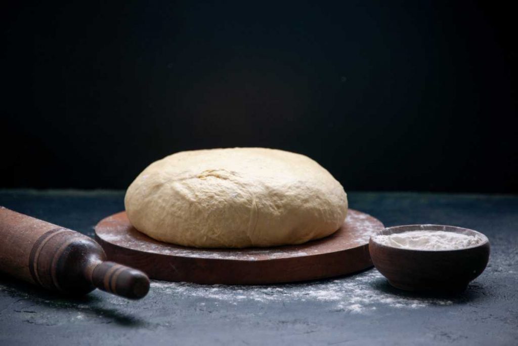 Fresh Raw Dough with black background