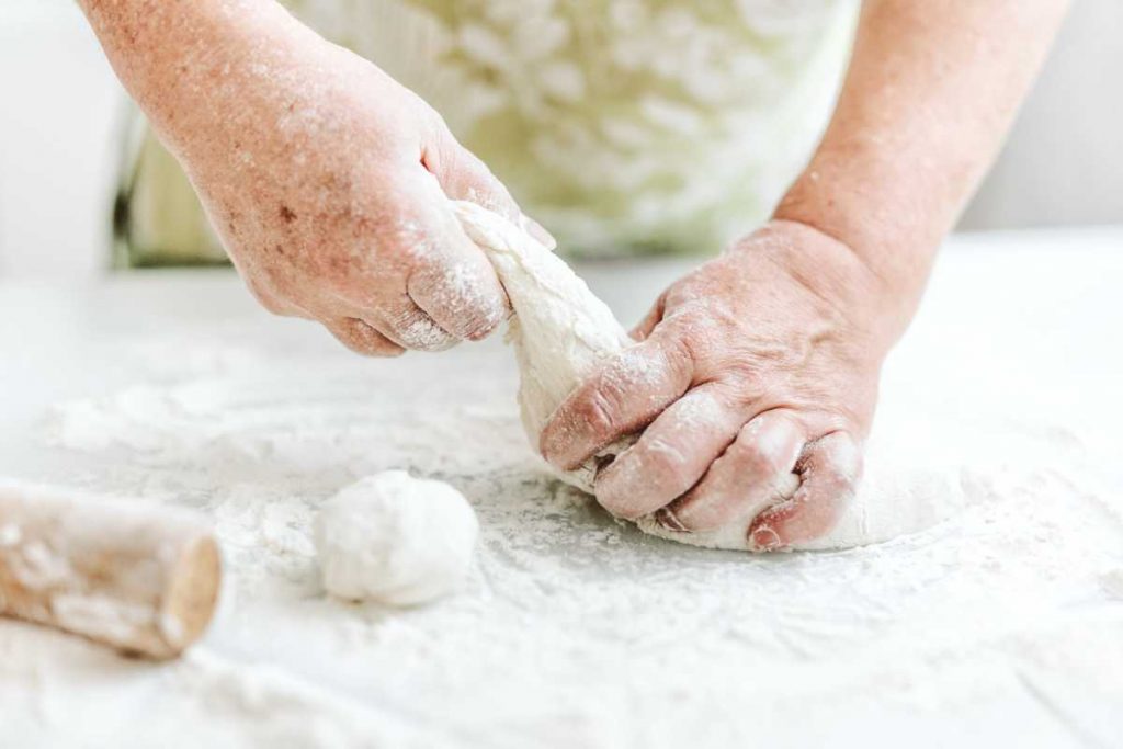 Women Kneading Dough